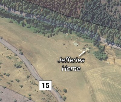 A birdseye view of property lines and topography in a rural area.